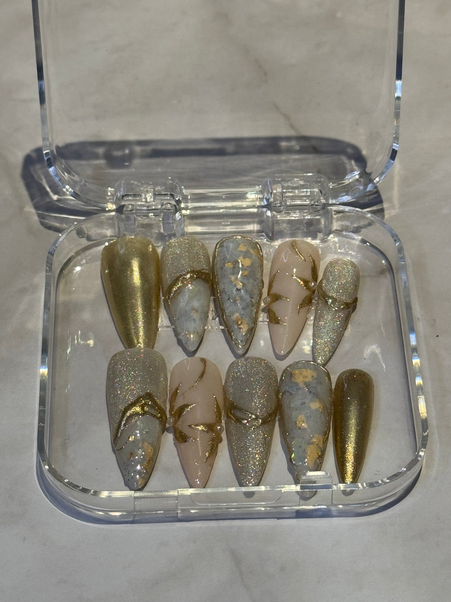 Gold Stilletto nails,with gold details,marble paint,and glitter elegant press on nails