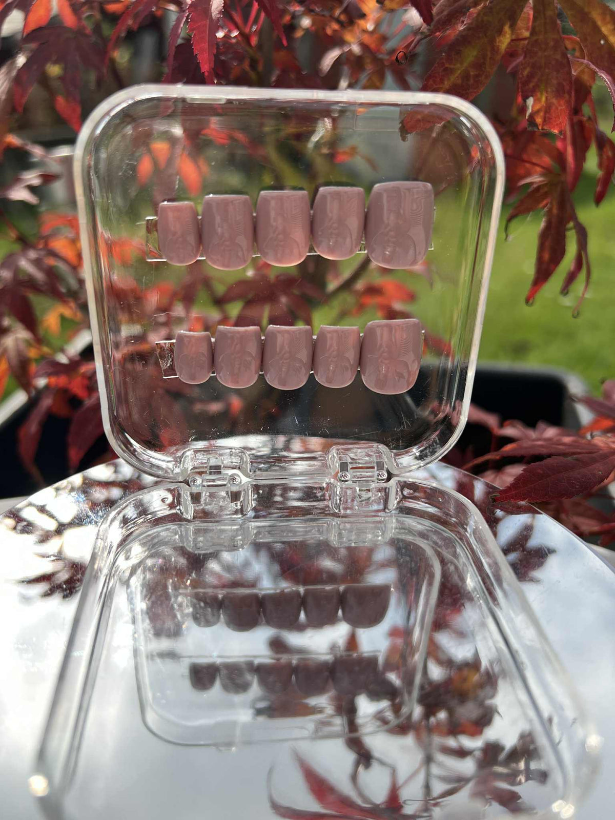 Short Square press-on nails in a warm light brown shade. Perfect for a natural, everyday look that complements any style.