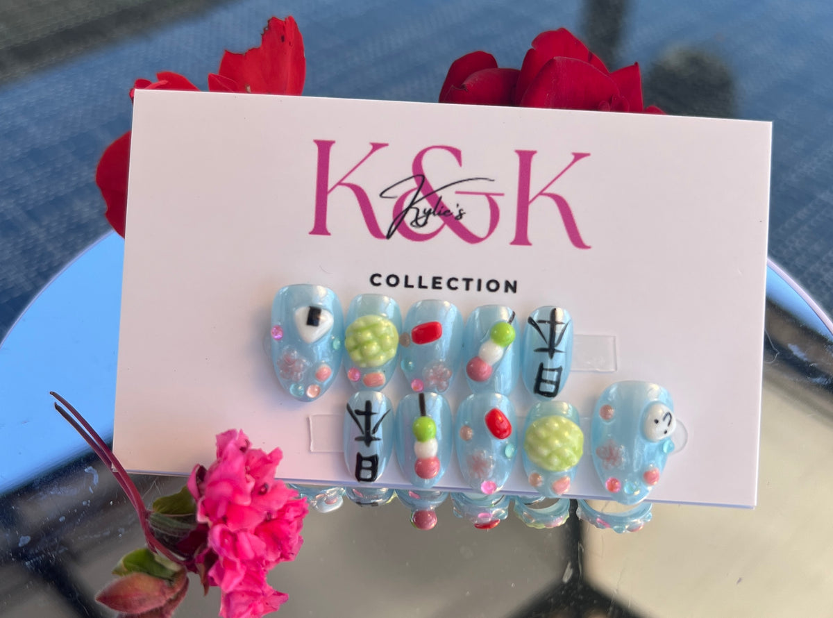One Size Kids handmade gel decoration inspired by Tokyo. Features intricate sushi details that capture the essence of Japanese nail art. Perfect for adding a touch of playful, artistic flair to young nails.