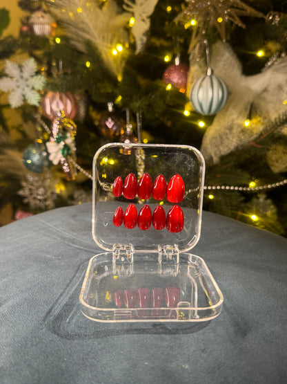 Luxury press-on nails, glossy romantic red, winter, Christmas.
